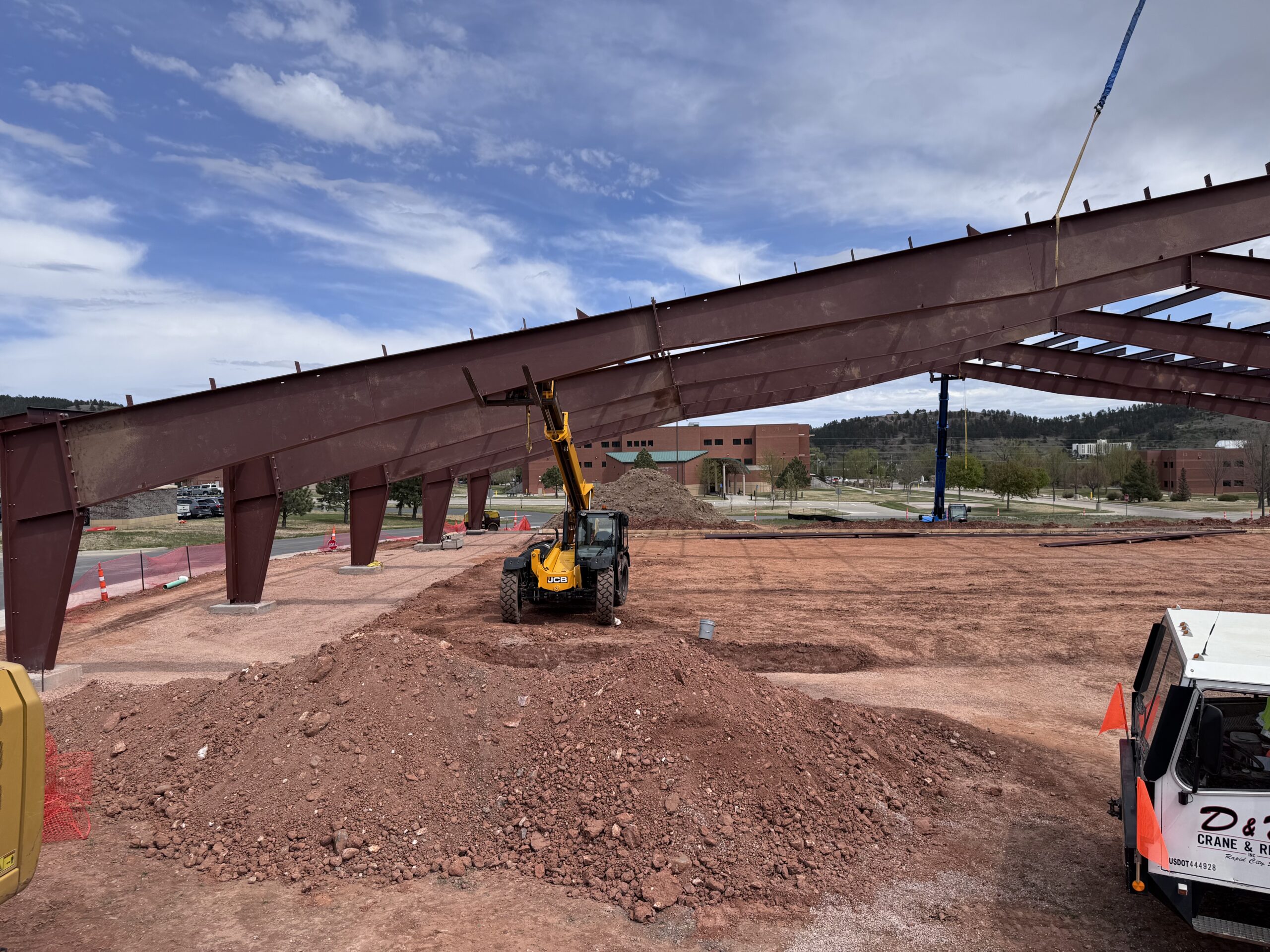 Crane setting steel at Camp Rapid construction project in Rapid City South Dakota